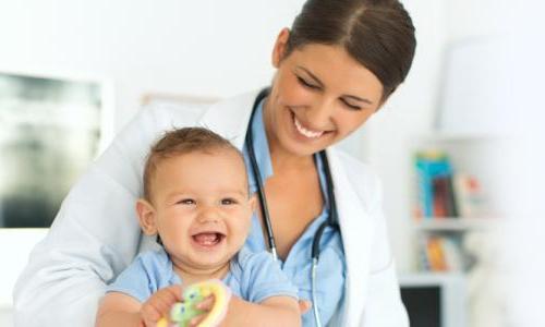 Pediatric nurse practitioner smiling with patient